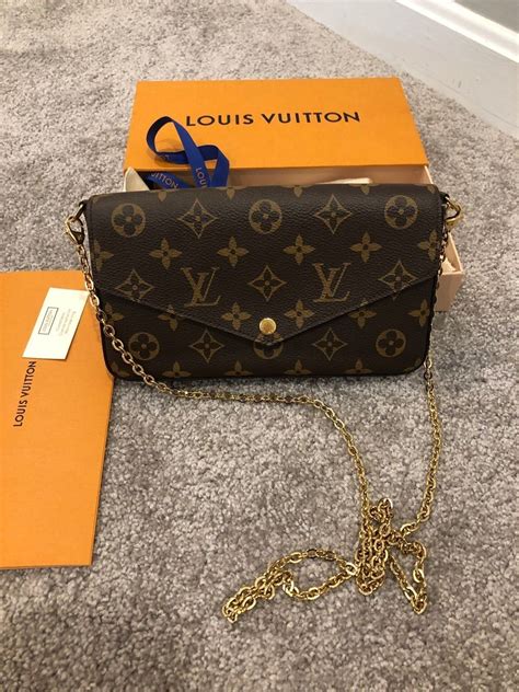 louis vuitton black purse gold chain|Louis Vuitton black bag price.